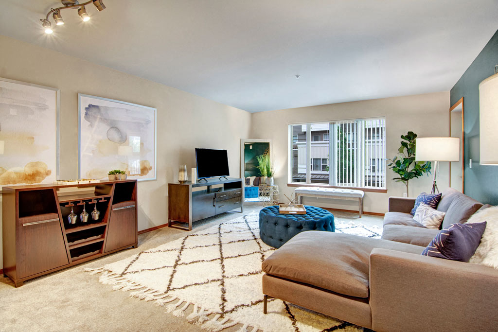 a living room with a couch and a tv